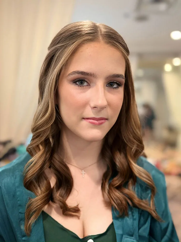 Teen client prepared and ready for her glam appointment
